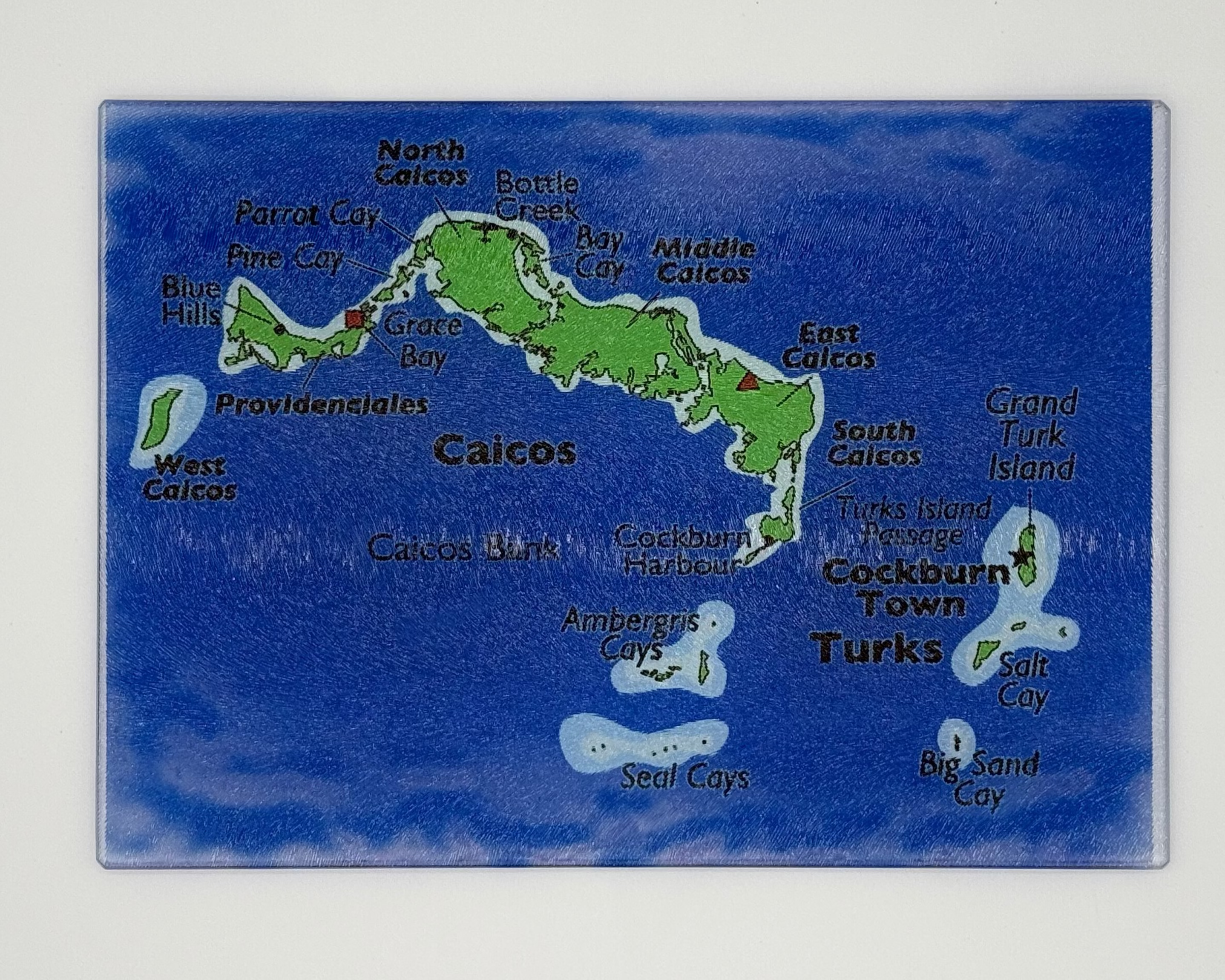 Map of the Turks and Caicos Islands on a glass rippled cutting board