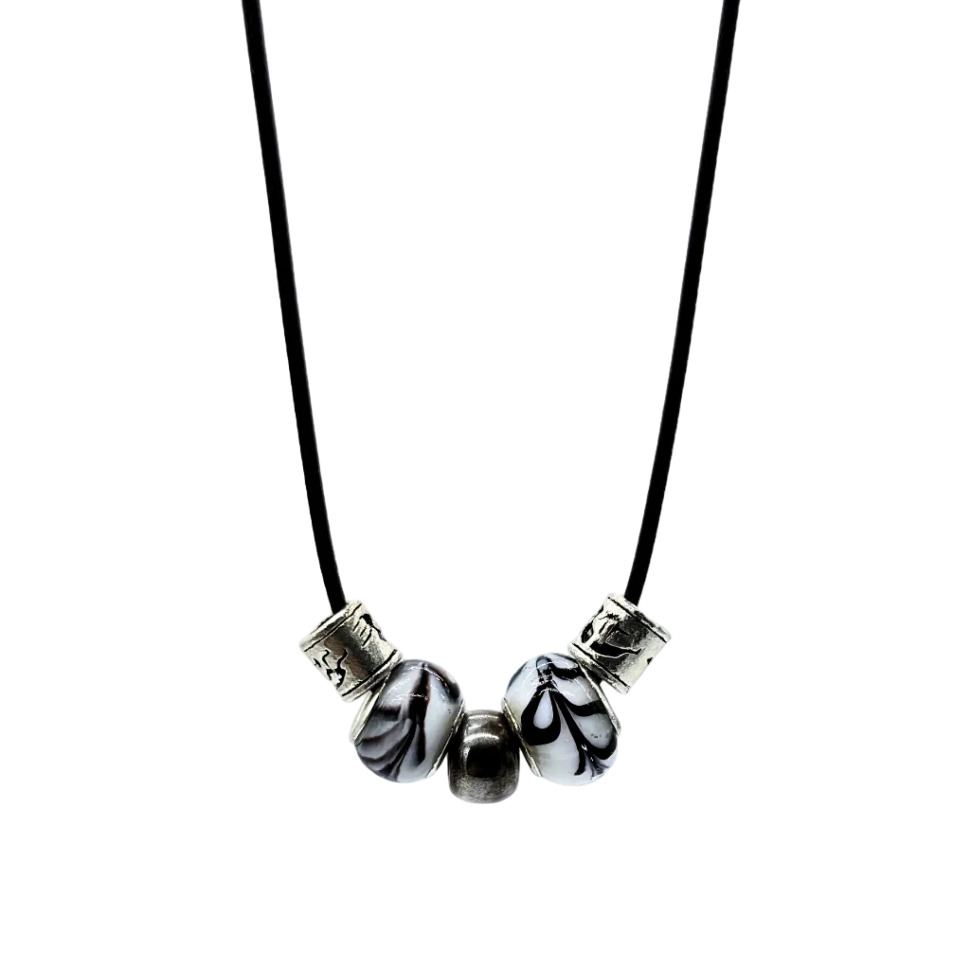 Necklace with black and white marbled beads on a light gray background