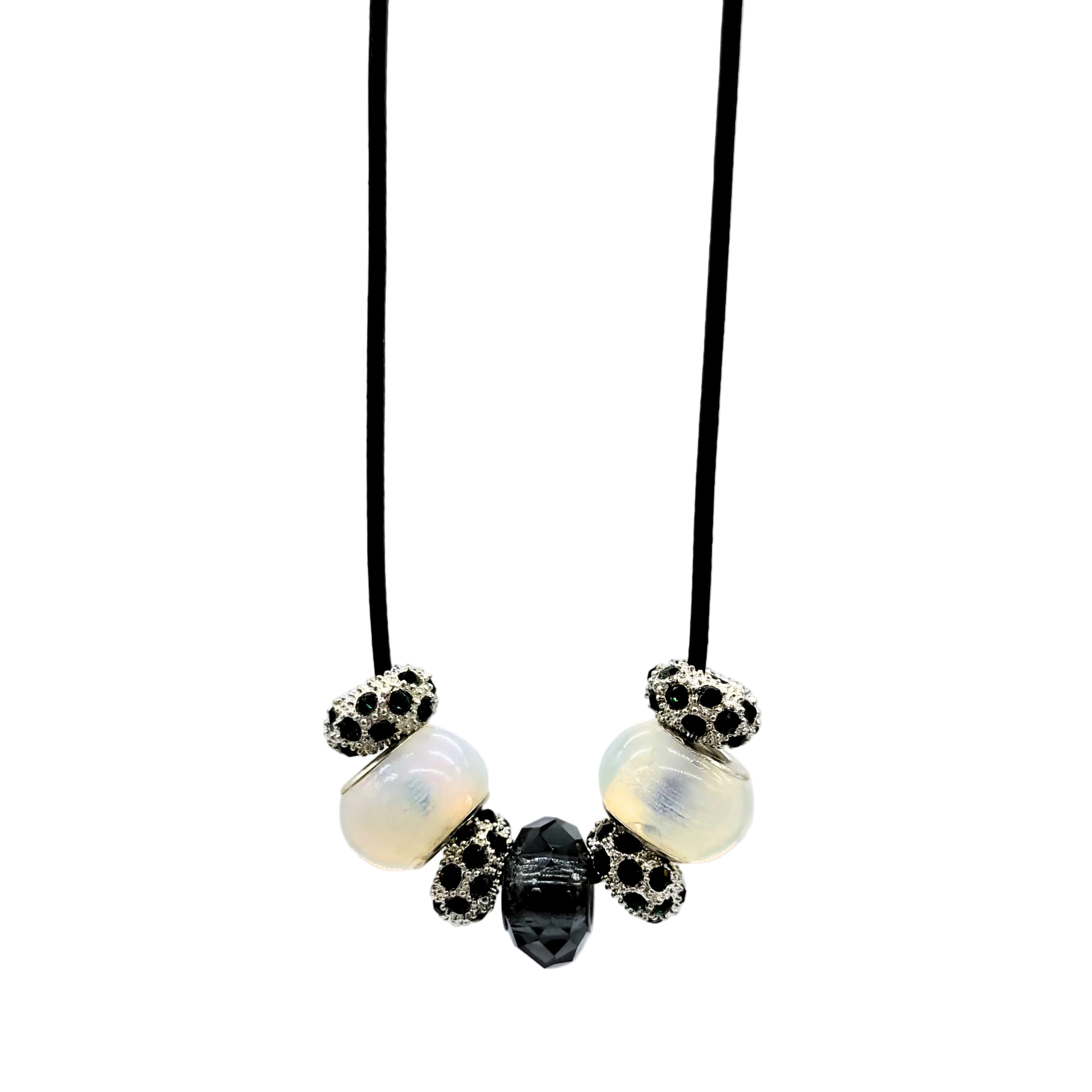 Necklace with decorative beads on a light gray background